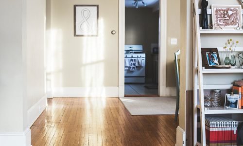 Bright and inviting home interior with hardwood flooring and stylish decor. Duluth Construction specializes in high-quality interior renovations, flooring installation, and custom carpentry to enhance modern living spaces.