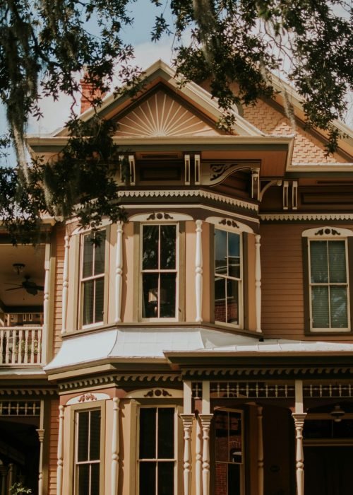 Elegant Victorian home featuring expert siding contractors, custom carpentry, and home window repair by Duluth Construction. A perfect blend of historic charm and modern craftsmanship.