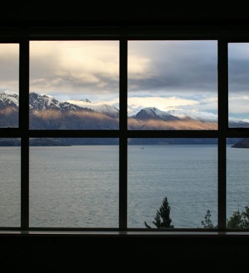 Stunning mountain and lake view through newly installed windows by Duluth Construction. Specializing in home window repair, window replacement, and custom carpentry, Duluth Construction enhances homes with expert craftsmanship. Trusted remodeling contractors serving Portland and beyond.